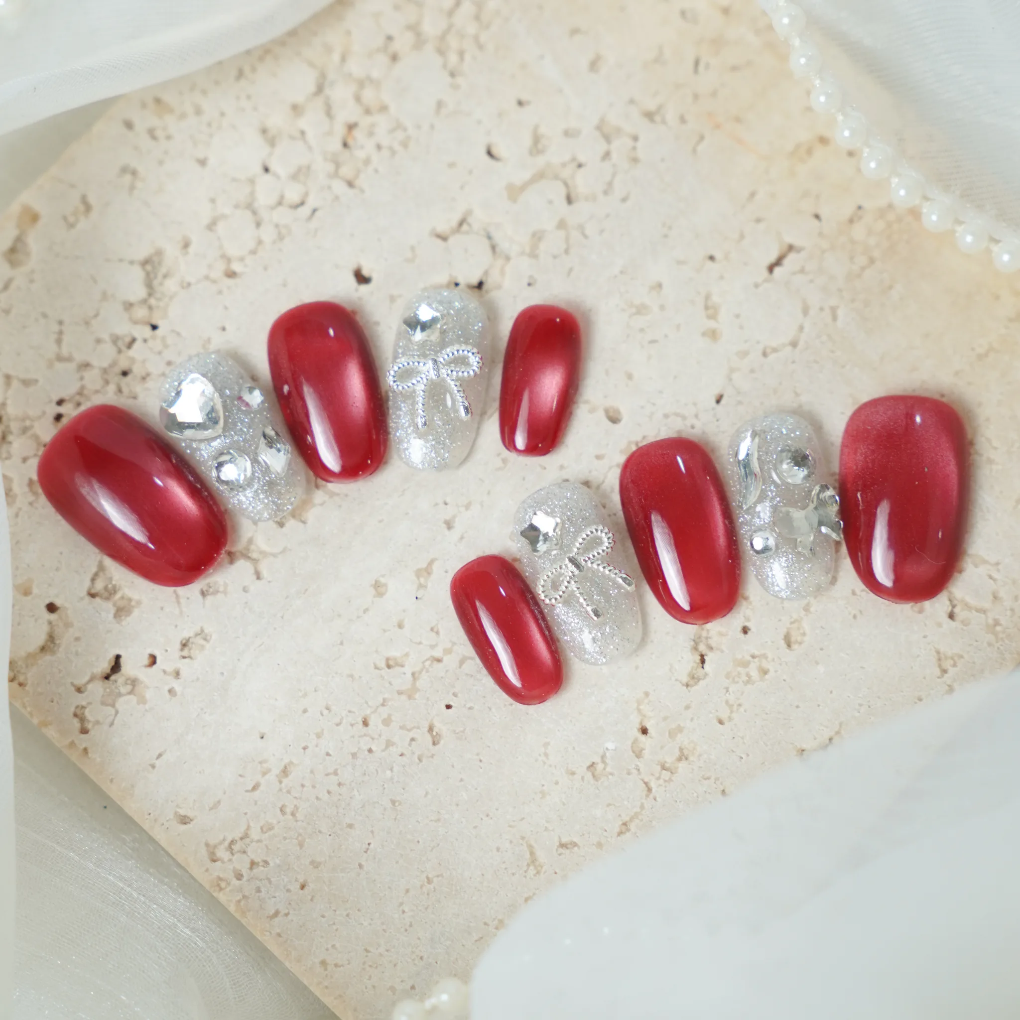 [M245] Nailbox mắt mèo đỏ đính đá (BST Tết 2026)