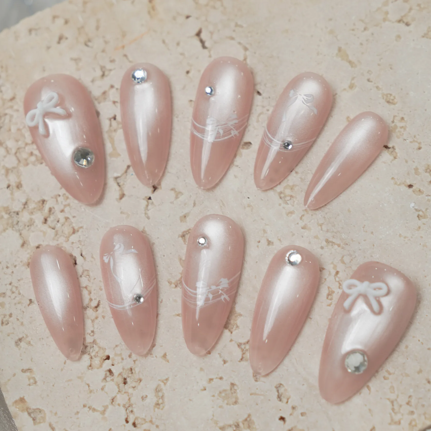 [M249] Nailbox thạch nude mắt mèo đính charm nơ, nơ ẩn mix đá