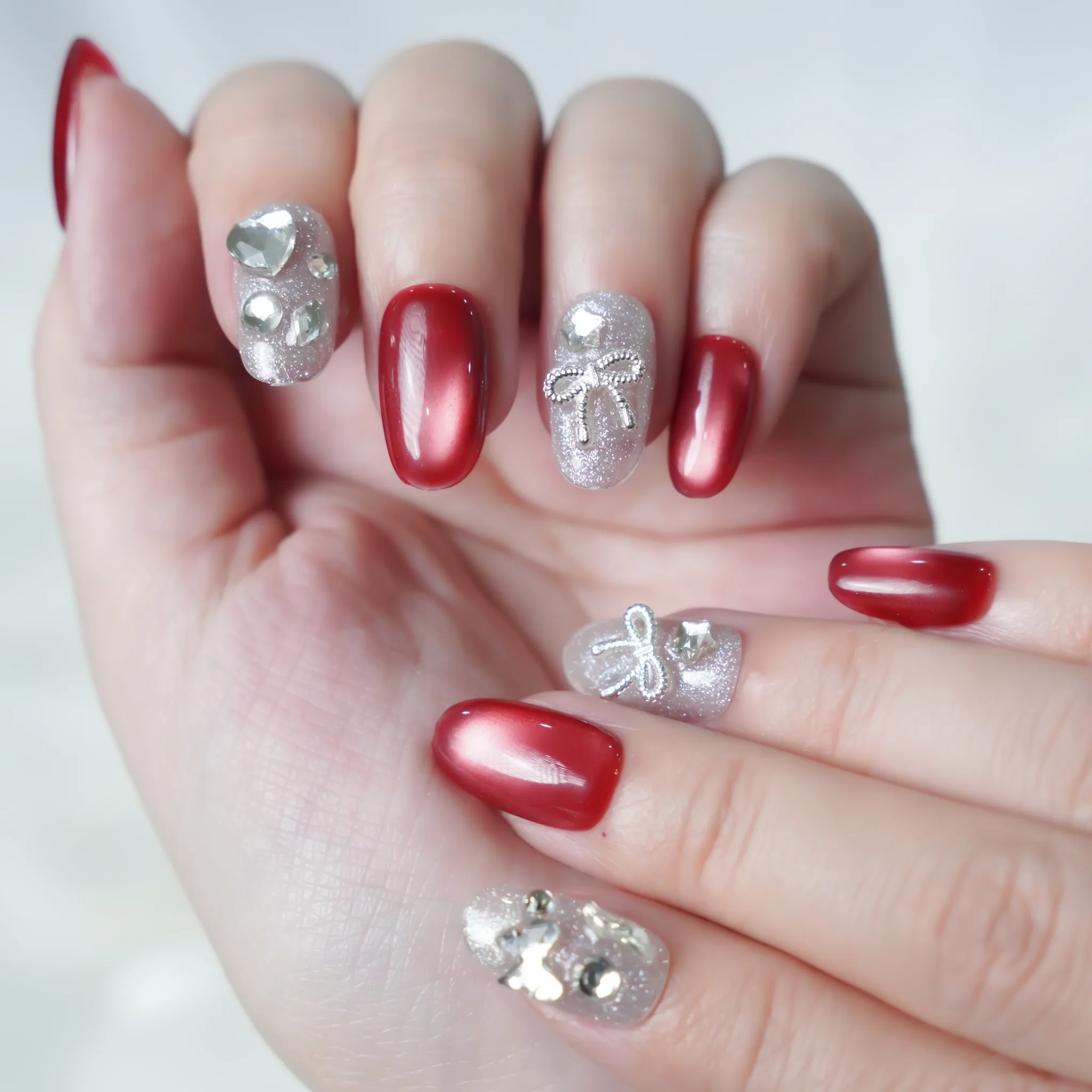 [M245] Nailbox mắt mèo đỏ đính đá (BST Tết 2026)