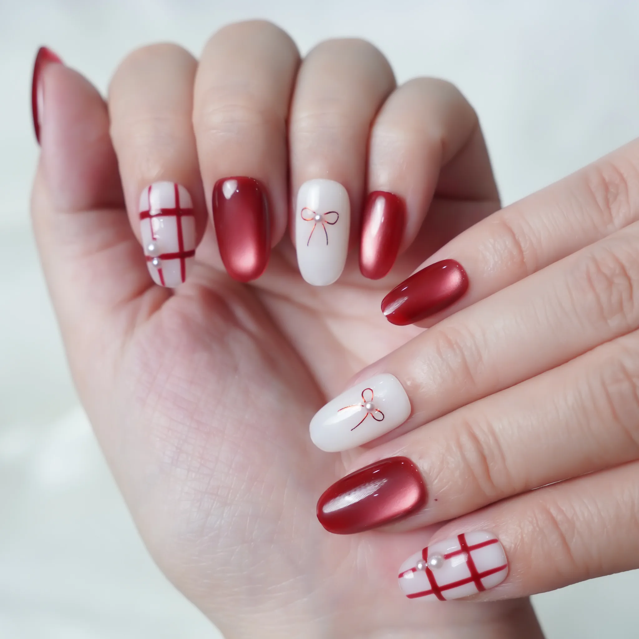 [M242] Nailbox mắt mèo đỏ mix trắng gạo đính nơ (BST Tết 2026)