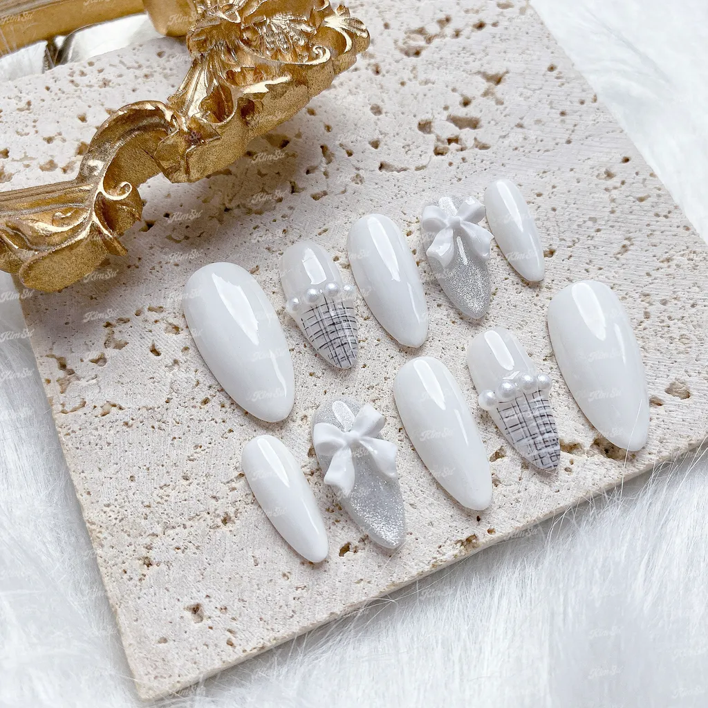[M069] Nailbox trắng đính nơ mix mắt mèo